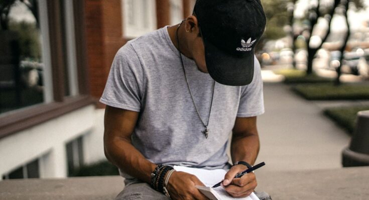 Person journaling about financial goals symbolizing clarity and growth.